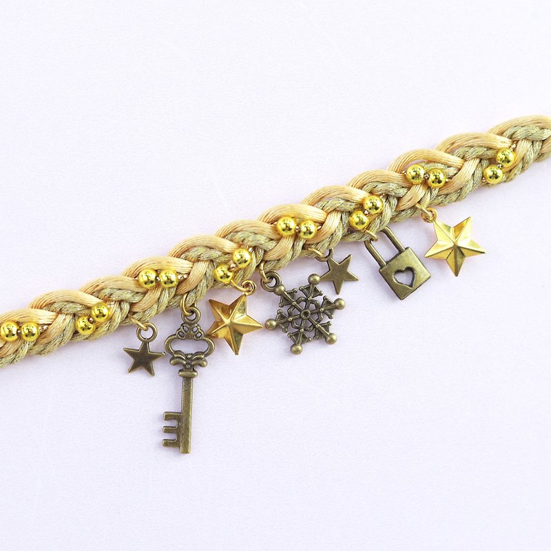 Gold braided bracelet with charms - สร้อยข้อมือ - เส้นใยสังเคราะห์ สีทอง