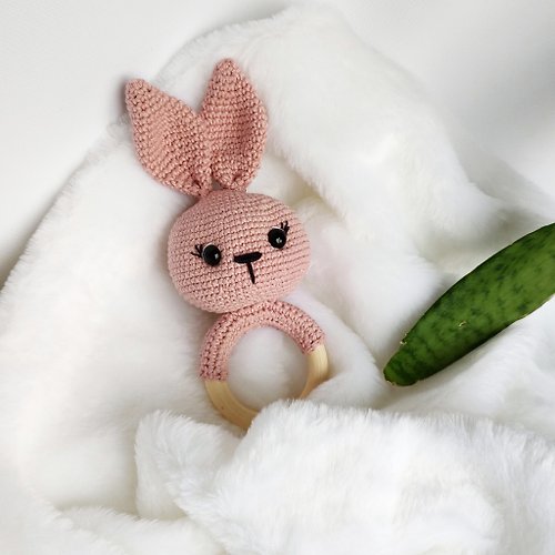 Knitting magic Rattle - rodent bunny is an excellent gift for babies, a gif