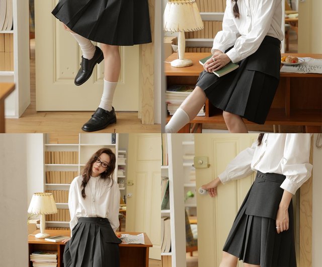 素朴なグレーのプリーツスカート、フレンチシックなアシンメトリー