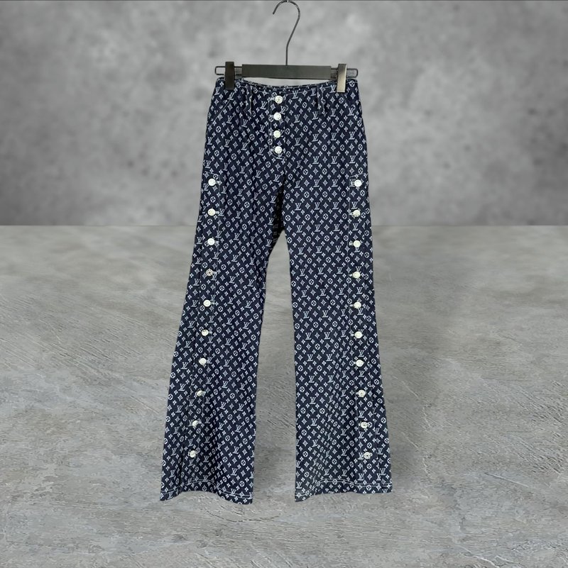 Pre-Owned Dark Blue Textured Denim Elastic Side Breasted Flared Low-Rise Trousers PF515 - กางเกงขายาว - เส้นใยสังเคราะห์ สีน้ำเงิน