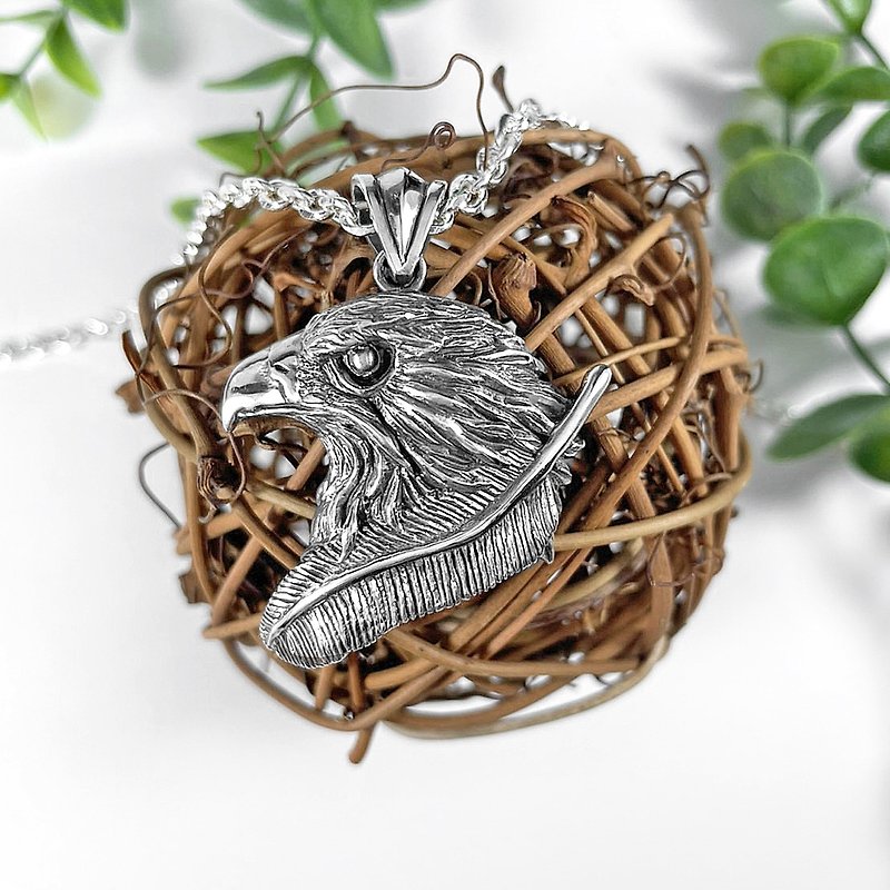 The silver pendant in the motif of a head of a hawk - Necklaces - Sterling Silver Silver