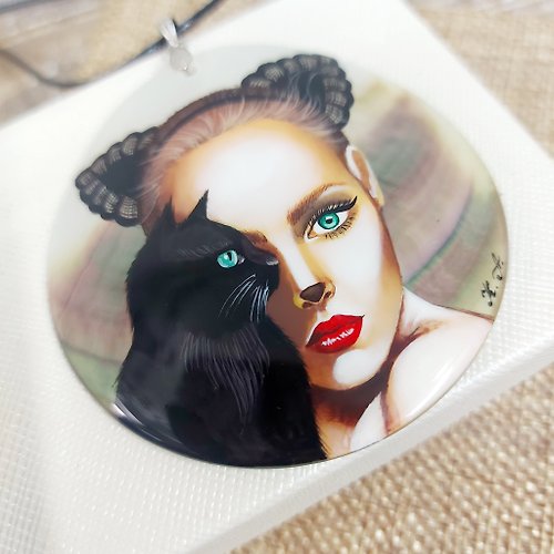 Charm.arts Catwoman with Green Eyes and black Cat on handmade pearl pendant. Dainty jewelry