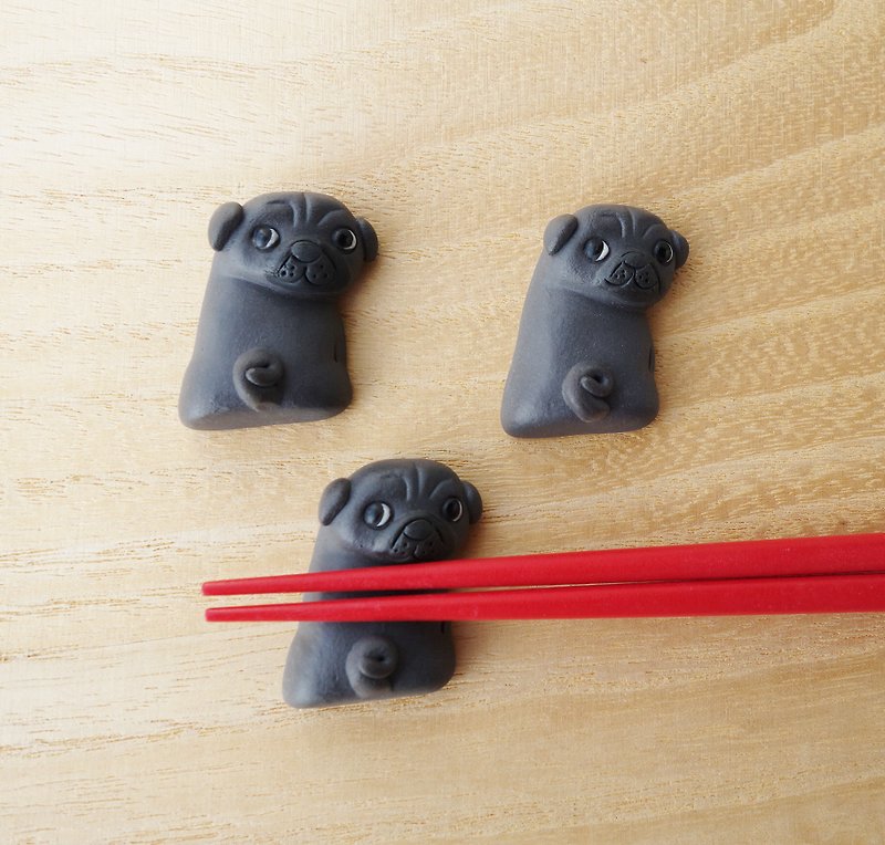 Black pug dog chopstick rest
