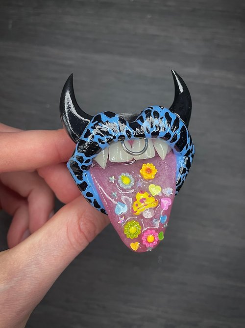 Polymer Diary Phone grip. Blue cow lips with horns.