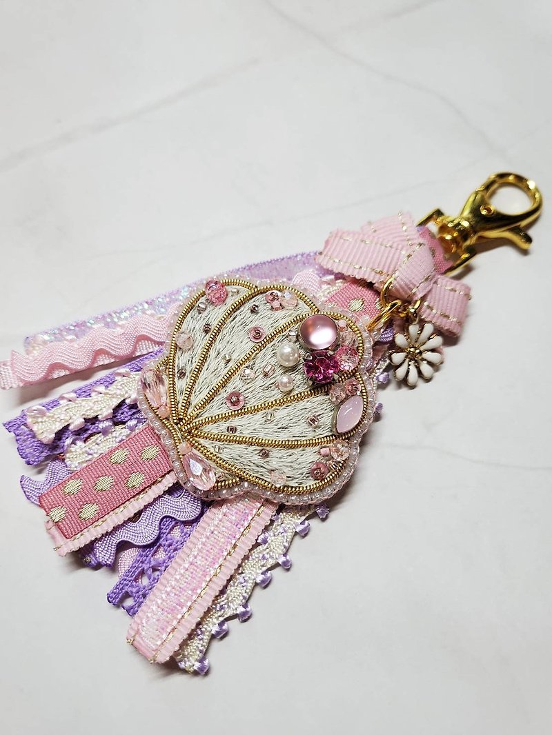 Pink shell with pink/purple tassel key chain