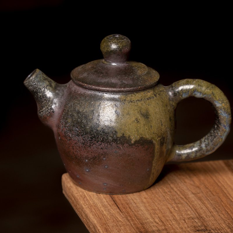 Huang Chungui-Charcoal-fired teapot
