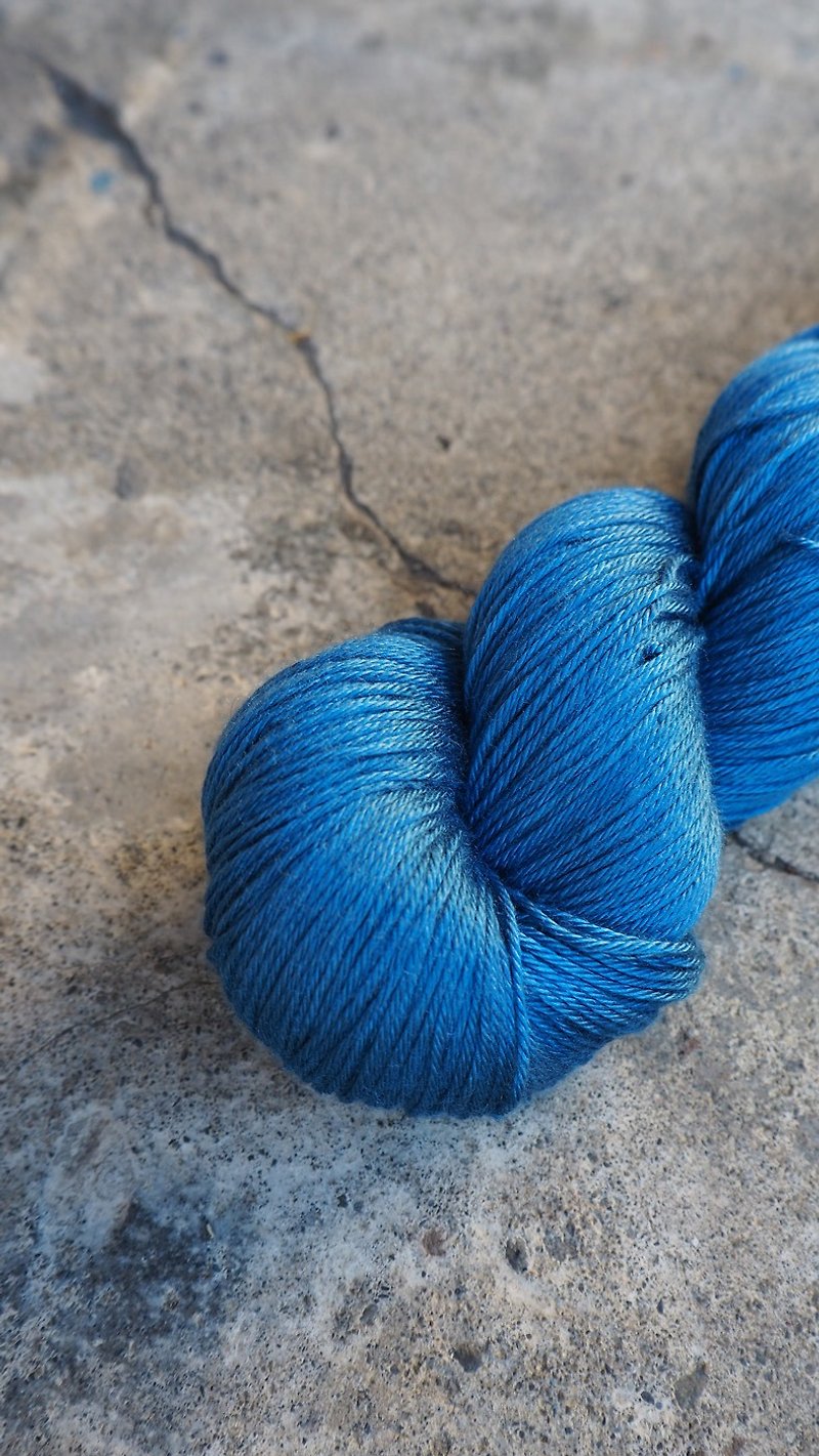 Hand dyed silk thread. blue