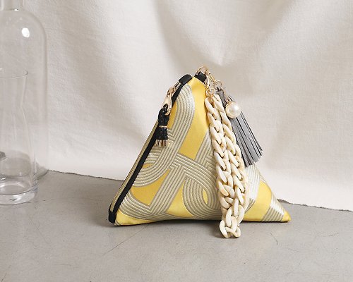 SENZADITE MAZE yellow triangular clutch pouch bag