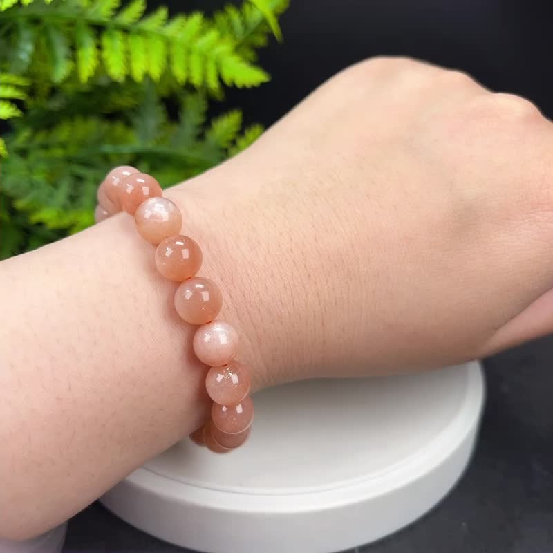 Boutique natural orange moonlight bracelet orange crystal bracelet female jewelry single circle golden sand cat's eye imagination 9.5mm - Bracelets - Crystal Orange