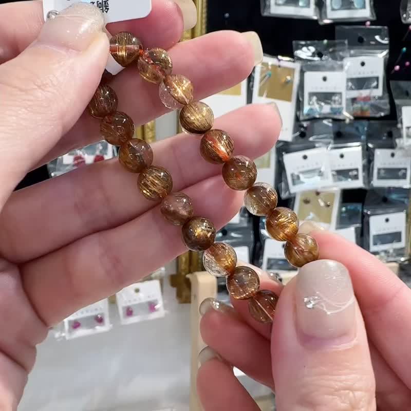 Small boutique Bronze-titanium Bronze hair crystal 7.5mm 15.3g to ward off evil spirits, turn bad luck into good luck, resolve turbidity and attract wealth - สร้อยข้อมือ - คริสตัล สีทอง