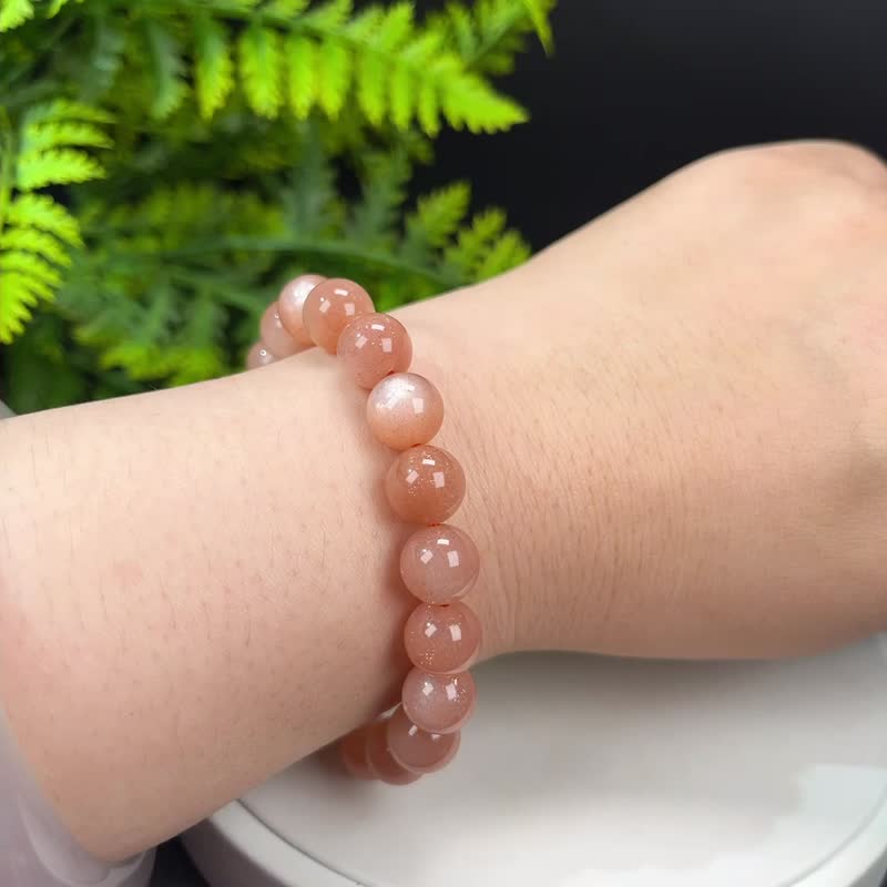 Boutique natural orange moonlight bracelet orange crystal bracelet female jewelry single circle golden sand cat's eye wisdom soft 10mm - Bracelets - Crystal Orange