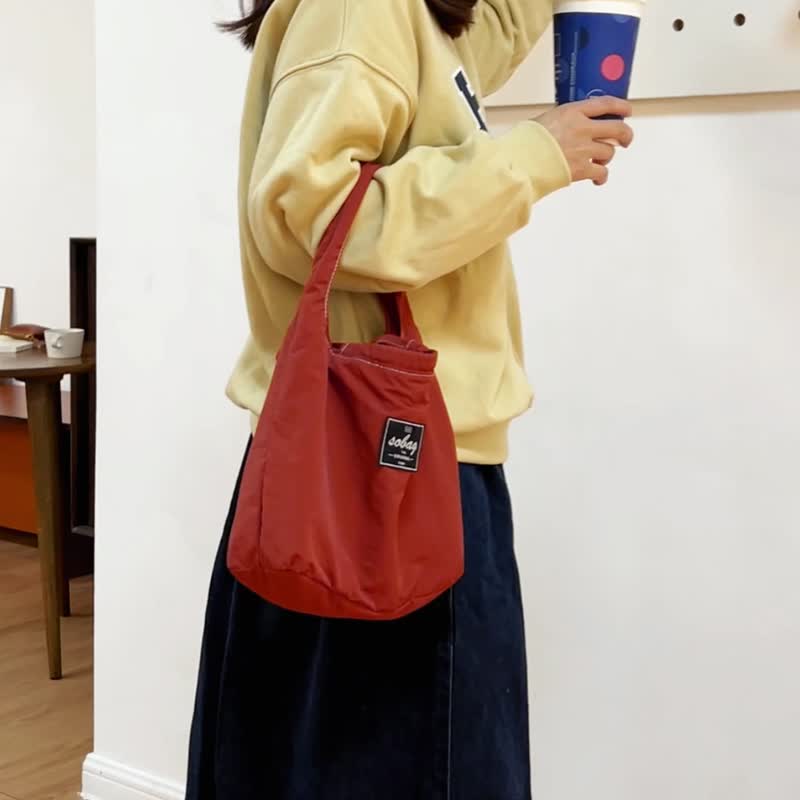 sobag lightweight casual waterproof nylon cloth hand-held underarm bag women's simple literary drawstring hand-held small bag - กระเป๋าถือ - ไนลอน สีแดง