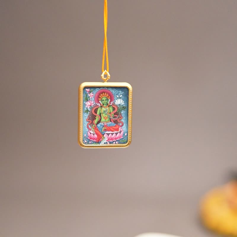 Green Tara Handmade Thangka Pendant – Sacred Amulet for Compassion - พวงกุญแจ - วัสดุอื่นๆ หลากหลายสี